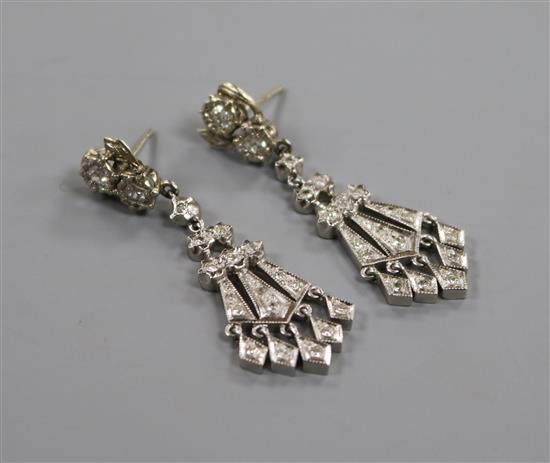 A pair of Art Deco style white metal and diamond set fan shape drop earrings, approx. 48mm.